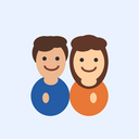 Two smiling children, one in blue and one in orange